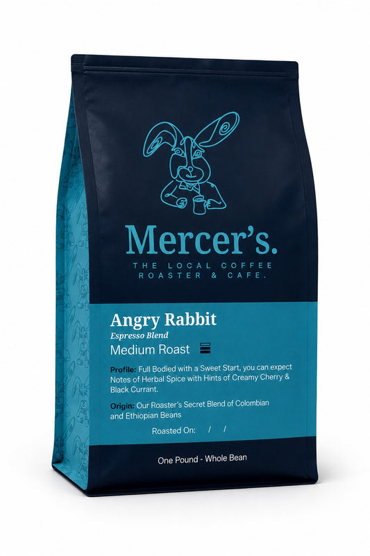 Mercer's Angry Rabbit Espresso Blend medium roast whole bean coffee in Mercer's signature navy coffee bag.